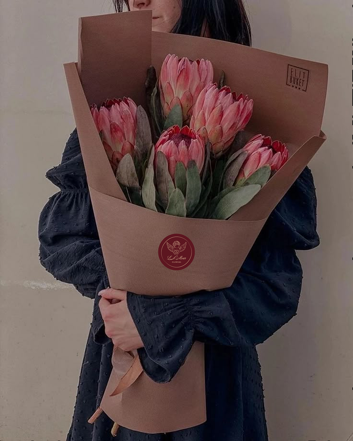 Bouquet with burgundy L'Amour Flowers seal